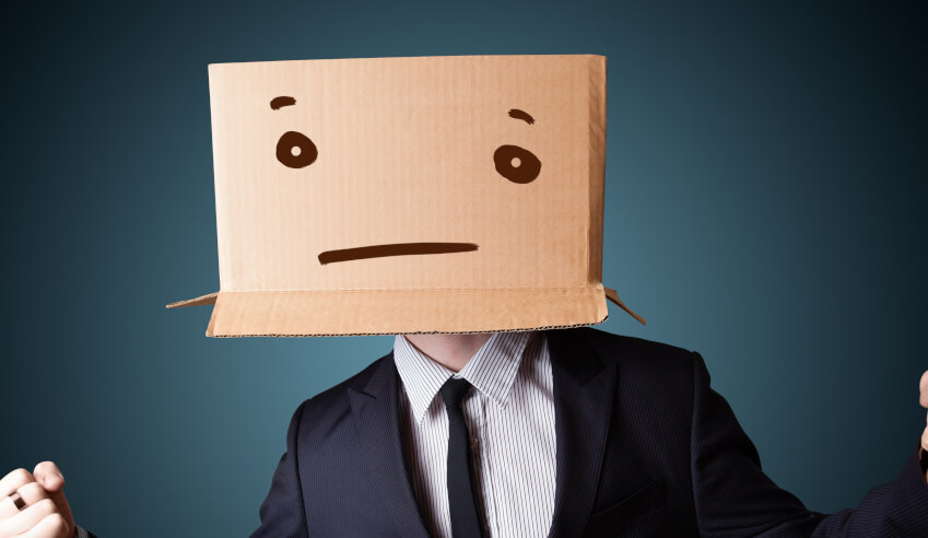 lawyer sad face brown carton box  on head professional lawyers depression